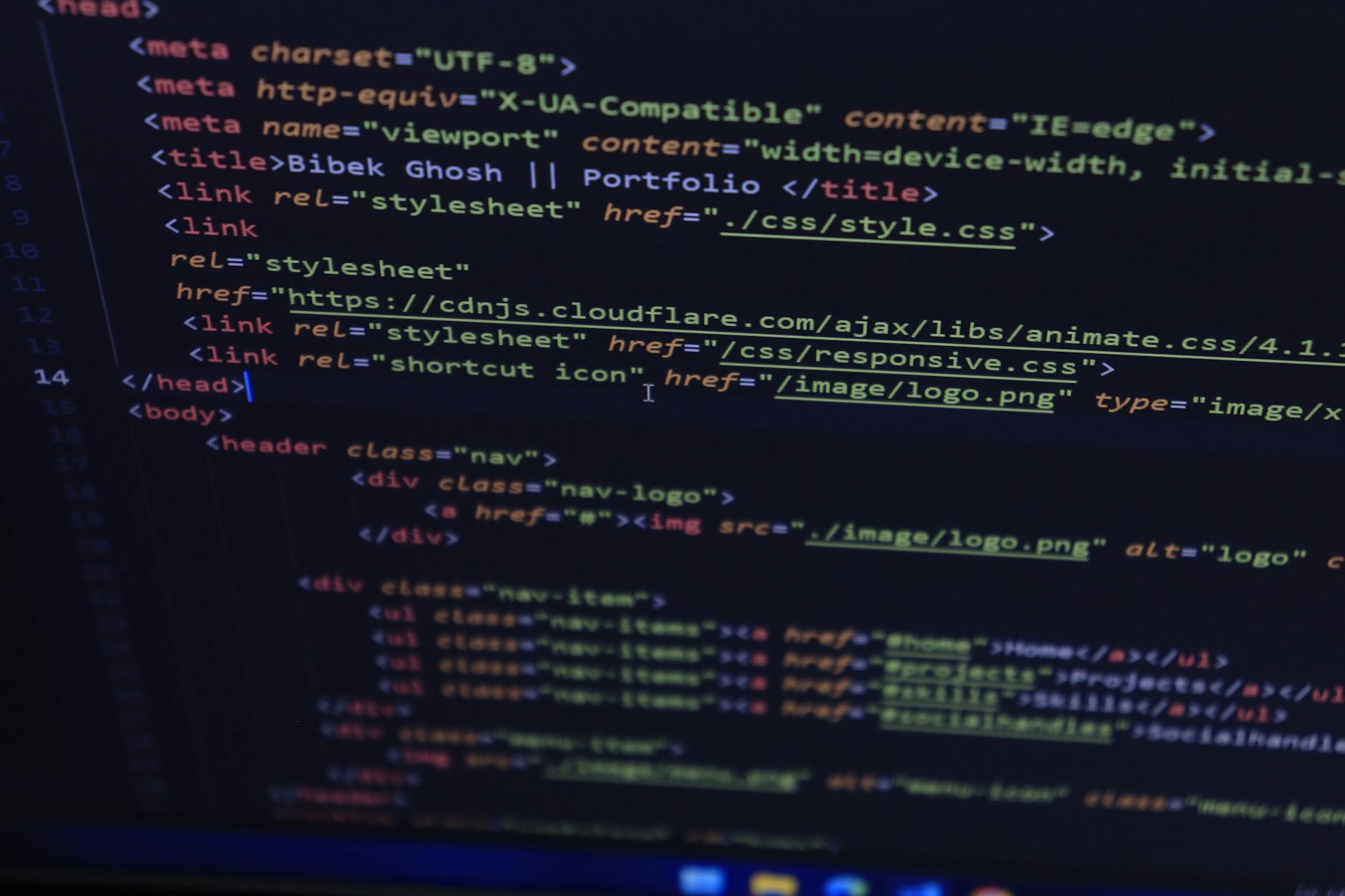 Close-up of HTML and CSS code displayed on a computer screen, ideal for tech and programming themes.